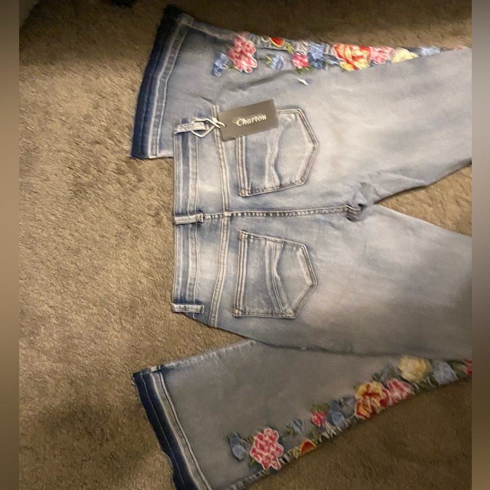 Women’s flower embroidered bell bottom jeans